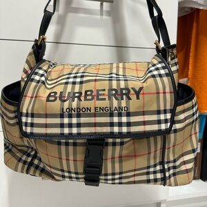 It is a Burberry diaper bag in excellent condition, like new.